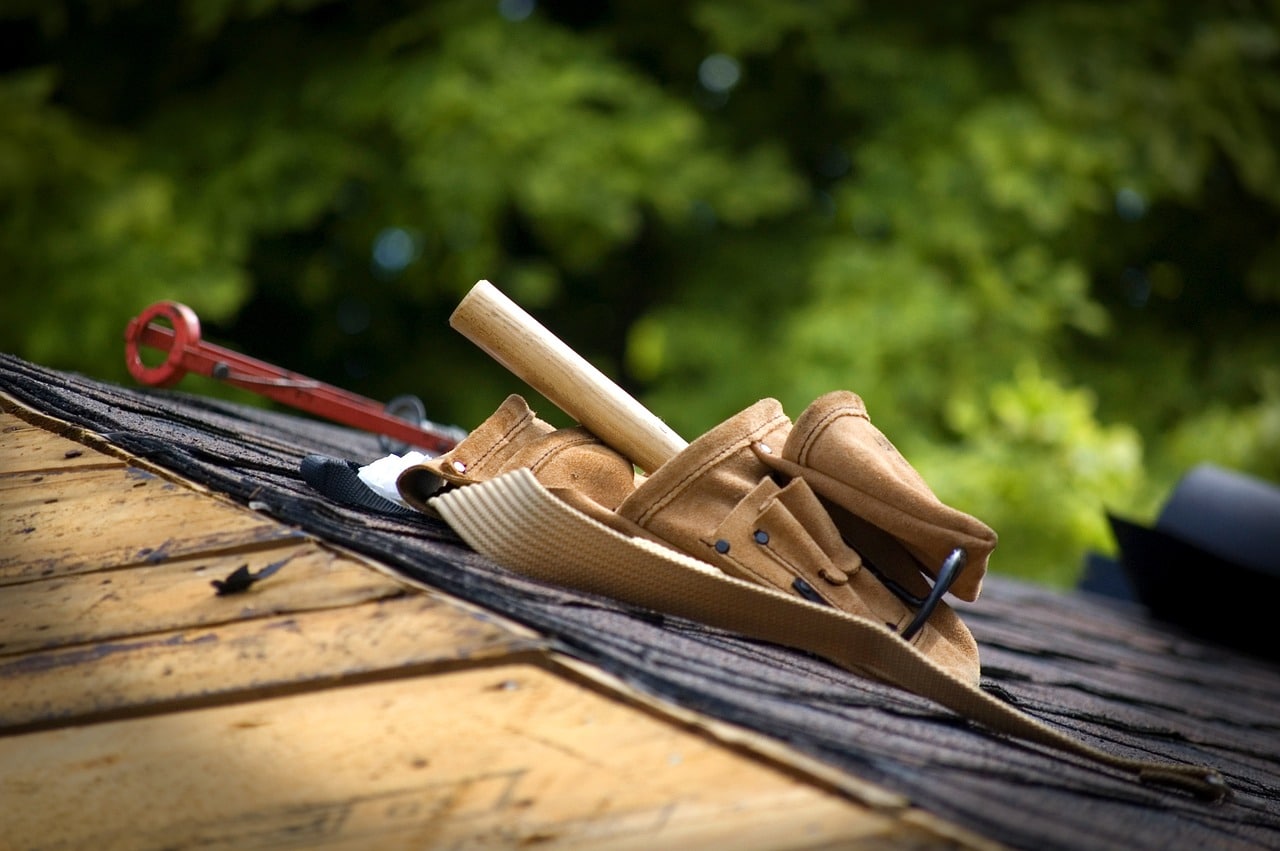 Construction tools sitting on top of rooftop for Builders Risk Insurance.