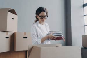 female student moving into college housing