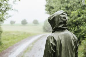 person standing in rain