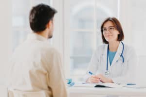 patient visits doctor using group health insurance policy