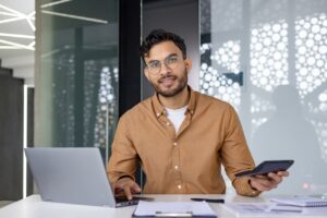 self employed man looking at different business insurance options