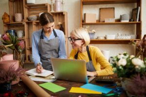 employees discussing general liability insurance for small businesses