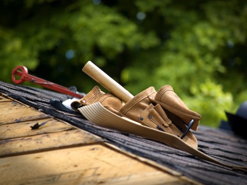 Construction tools sitting on top of rooftop for Builders Risk Insurance.