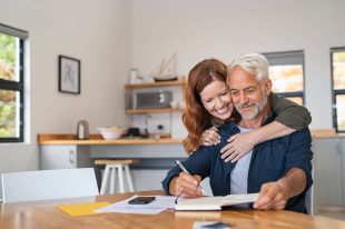 man signs up for employee benefits